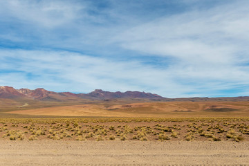 Background with barren desert scenery in the Bolivian Andes, in the Nature reserve Edoardo Avaroa