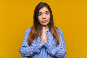 Obraz premium Young girl with striped shirt pleading