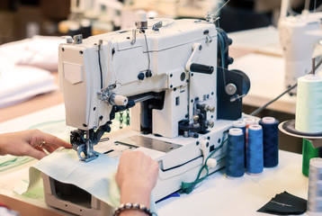 industrial overlock sewing machine in work