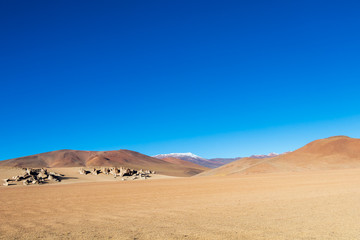 Background with barren desert scenery in the Bolivian Andes, in the Nature reserve Edoardo Avaroa