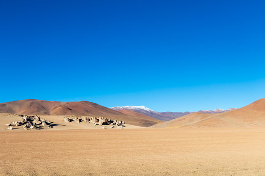 Background with barren desert scenery in the Bolivian Andes, in the Nature reserve Edoardo Avaroa
