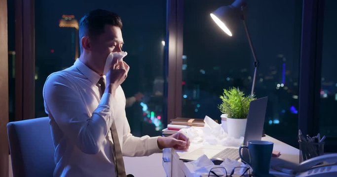 sick businessman work overtime