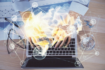 Man typing on keyboard background with brain hologram. Concept of big Data.