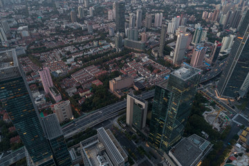 Fototapeta na wymiar Aerial view of business area and cityscape in the dawn, West Nanjing Road, Jing` an district, Shanghai