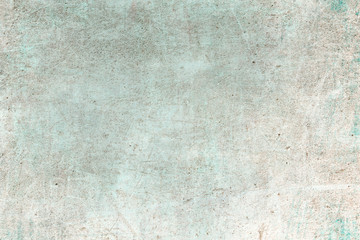 Old blue grungy wall background or texture