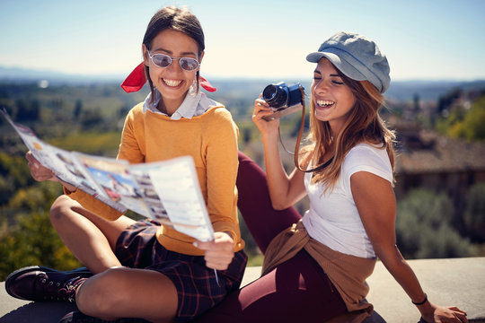 Two girls enjoying in vacation time and taking picture..