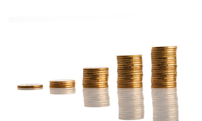 Savings Coins, increasing columns of gold coins on white