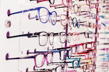 Optics store, set of glasses in shop windshield, medetsin.