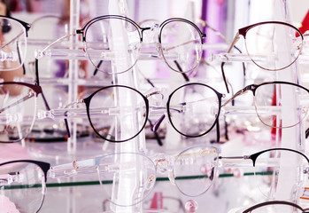 Optics store, set of glasses in shop windshield, medetsin.