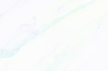 Green and purple splash on the paper