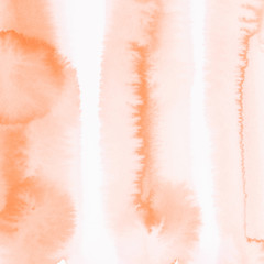 Soft orange watercolor paint on white background