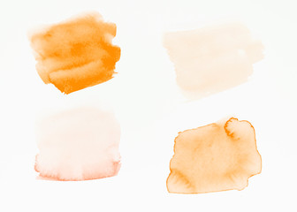 Fototapeta premium An orange brush strokes isolated on white backdrop