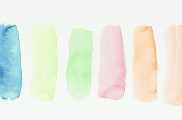 Set of watercolor colorful brush strokes on white background