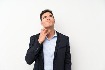Handsome man over isolated white wall thinking an idea