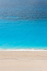 Fototapeta na wymiar Blue sea on the Milos beach in Lefkada island, Greece.