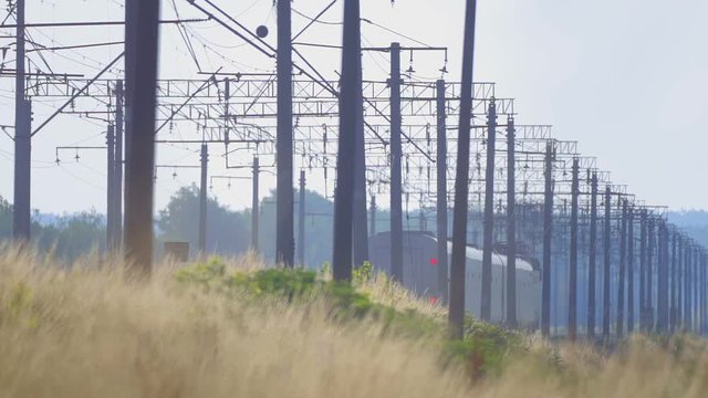 The movement of trains by rail in the countryside. East European Railway.
