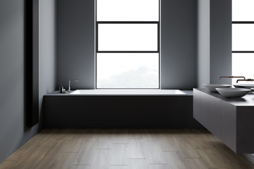 Loft dark gray bathroom, double sink and tub