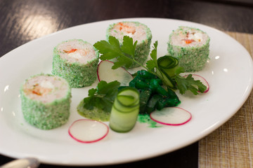 Delicious fish dish with herbs in the restaurant
