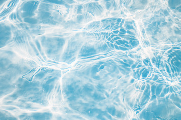 blue water in the pool in the sun close up