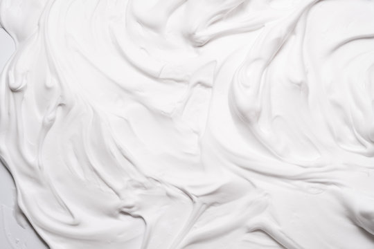 White foam texture abstract art background. Airy mousse decorative pattern wallpaper.