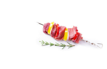Beef meat kebab shashlyk on a skewer isolated on white background with rosemary