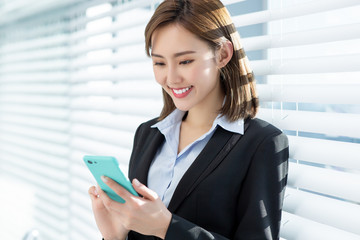 asian business woman use phone