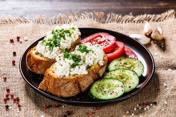 Sandwiches with cottage cheese and vegetables