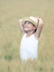 a little boy in the field  a life in the countryside