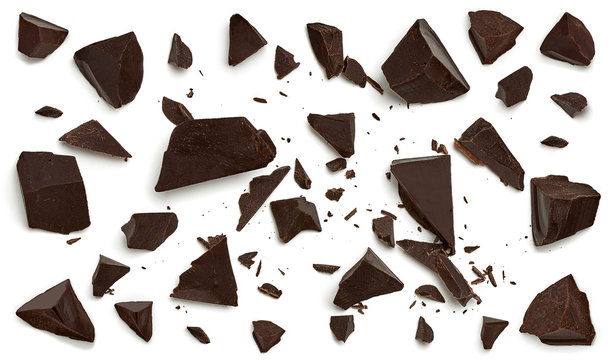 Broken chocolate pieces  or morsels cracked chocolate parts isolated on white background