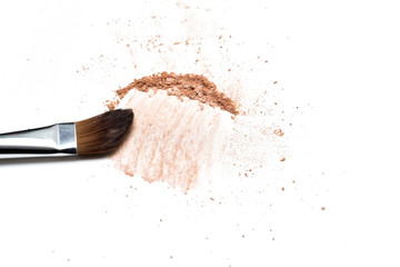Make up brush with selection of colored make up powder