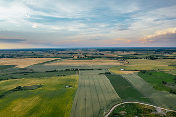 Sunset sky over the agricultural field.