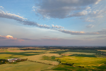 Fototapeta na wymiar Sunset sky over agricultural fields in western Poland.