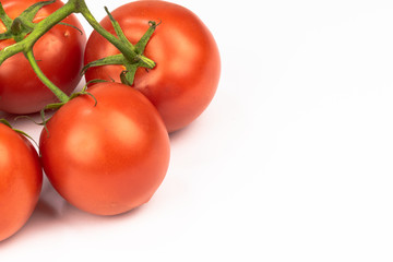 bunch of tomatoes isolated on right side white background