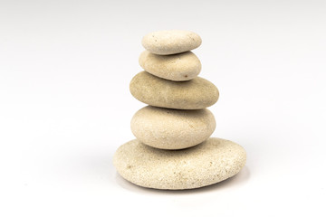 stack of zen stones isolated white background