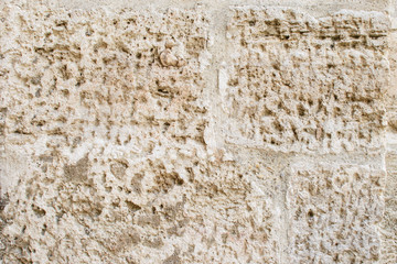 Fragment of old stone wall.