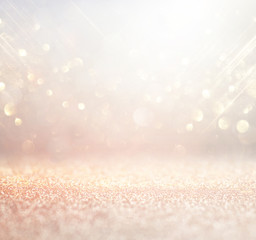 glitter vintage lights background. silver and white. de-focused