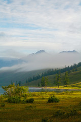 Morning on the lake Hovsgol against the background of the Sayans