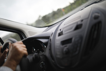 Fototapeta premium Businessman driving car