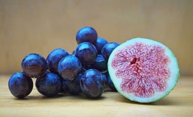 Ripe red Grapes and Fig, food for the proper functioning of the heart muscle