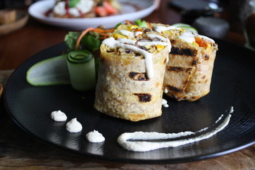 Creative burrito bali style with cucumber roll and cream