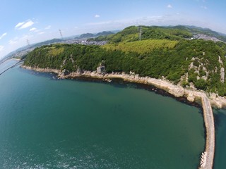 Aerial view by the sea on a sunny day