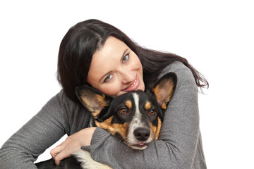 Charming brunette holds a Welsh Corgi Cardigan