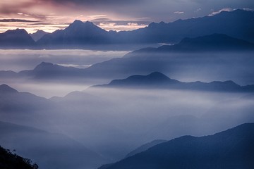 View of the foggy valley in Sierra Nevada de Santa Marta, Cordillera, Colombia  dramatic scene, beautiful world,scenic view with cloudy sky, majestic impressive dawn in mountain landscape, wallpaper