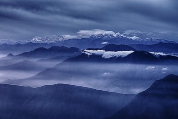 View of the foggy valley in Sierra Nevada de Santa Marta, Cordillera, Colombia  dramatic scene,...