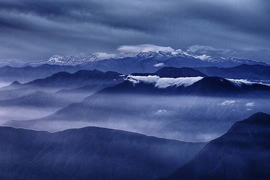 View of the foggy valley in Sierra Nevada de Santa Marta, Cordillera, Colombia  dramatic scene, beautiful world,scenic view with cloudy sky, majestic impressive dawn in mountain landscape, wallpaper