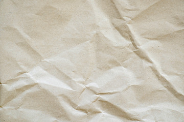 Crumpled recycled paper. Secondary use. Brown shade.
