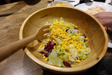 Fresh salad and corn cone