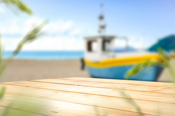 Desk of free space and blurred background of beach 
