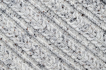 Abstract textured background of close up detail of knitting in a handmade sweater