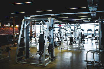 Modern light gym. Sports equipment in gym